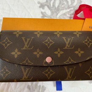 Sold 100% authentic Louis Vuitton emilie wallet